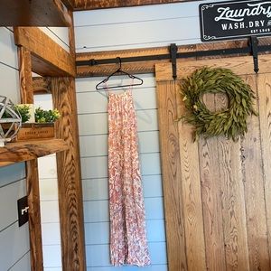 Never worn large floral dress cute cut out design on the back